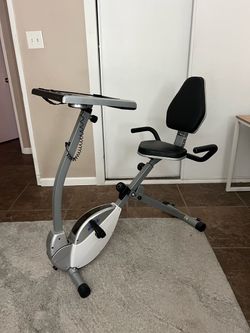 Exercise bike with built in workstation desk
