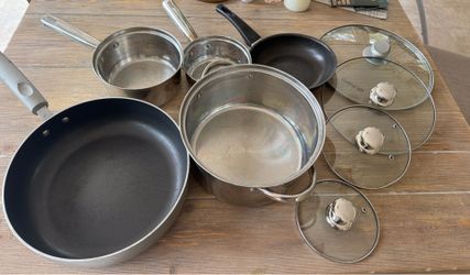 3 stainless steel pots and 2 pans