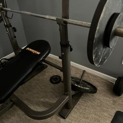 Weight Bench, W/bar & Two 45 Lb Plates