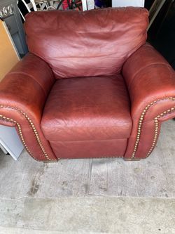 Leather comfy brown with silver studs arm chair