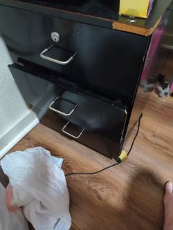 3 drawer long black file drawer on wheels.
