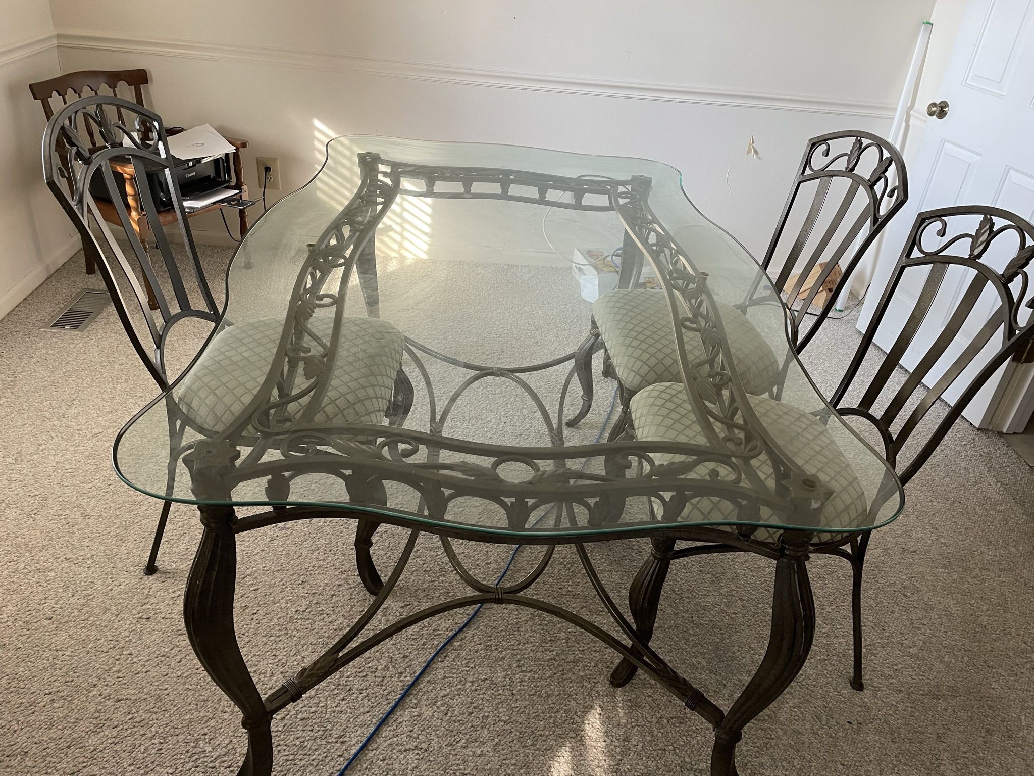 Wrought Iron glass top dining room table
