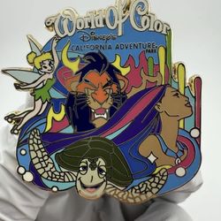 World of Color 2010 Disney's California Adventure Parks Gold Tone Enamel https://offerup.com/redirect/?o=UGluLm5ldw==