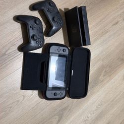 Nintendo Switch 1 And Two Nintendo Controllers