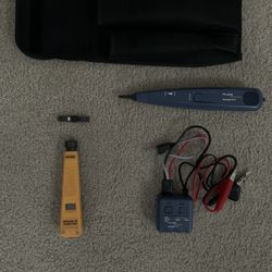 Fluke Pro3000 with punch/cut tool