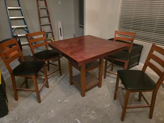 Counter height dining table and stools
