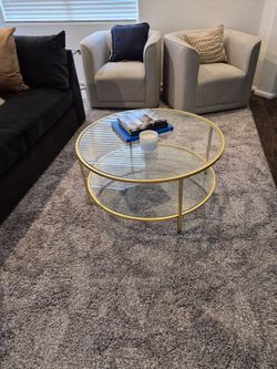 Round glass two tier coffee table