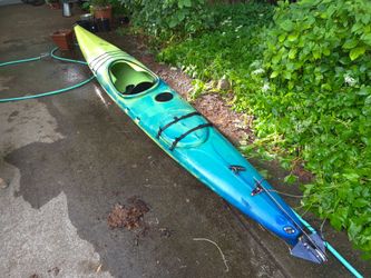 Kayak, paddle, and life vest