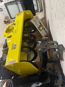 44 inch John Deere snow thrower with hydraluic lift