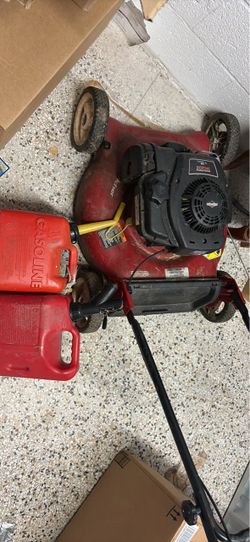 Craftsman Lawn Mower + 2 Gas Cans.”