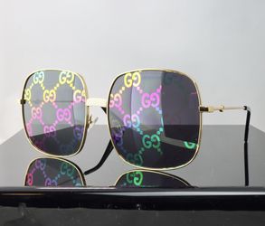Gucci Geometric Sunglasses in Gold with GG Pattern Lens