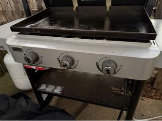 Weber flat top griddle only used a few times as a cover everything with it has the lid that goes over the flat top and a complete cover it for Weather