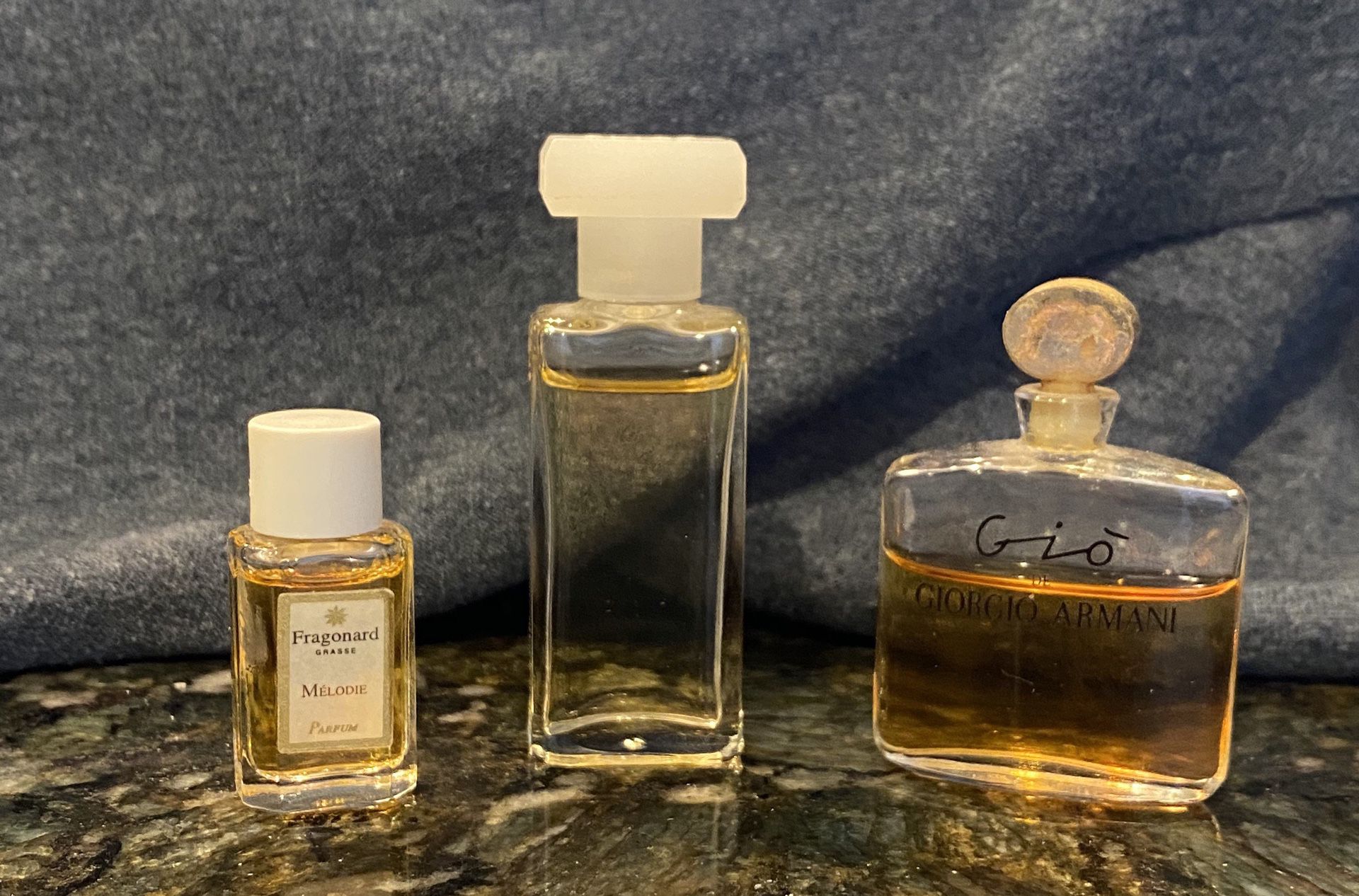 3 mini perfumes used a few times. Gio by Giorgio Armani, Elige and Fragonard Melodie