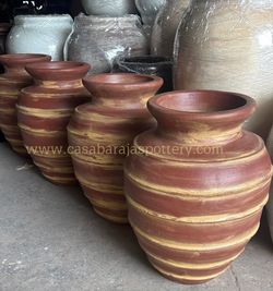Olive Jars 26"tall With drain hole ($145 each)In "Casa Barajas Talavera And Clay Pottery Store " Cypress Ca 