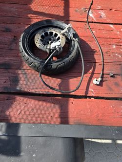 Scooter tire wheel with disc brakes