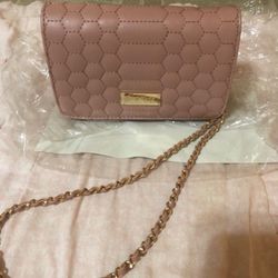 KATYA LEATHER CROSSBODY BEBE BAG. BRAND NEW