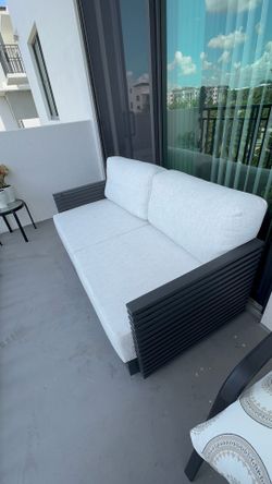 Monterey Black Aluminum Loveseat With Light Gray Cushions