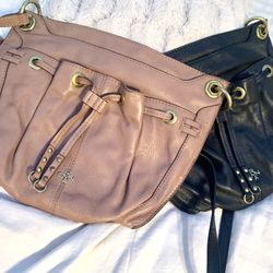 Black and tan Oryany handbags