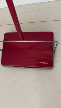 Casabella Compact Carpet Sweeper, a lightweight, non-electric floor cleaner designed for quick touch-ups on both rugs and hard surfaces.$24