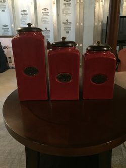 Pier One red glass canister set