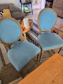 Two bar height chairs