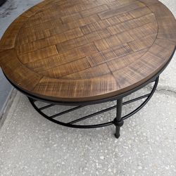 Bassett Mirror Emery Farmhouse Round Wood Cocktail Table in Brown