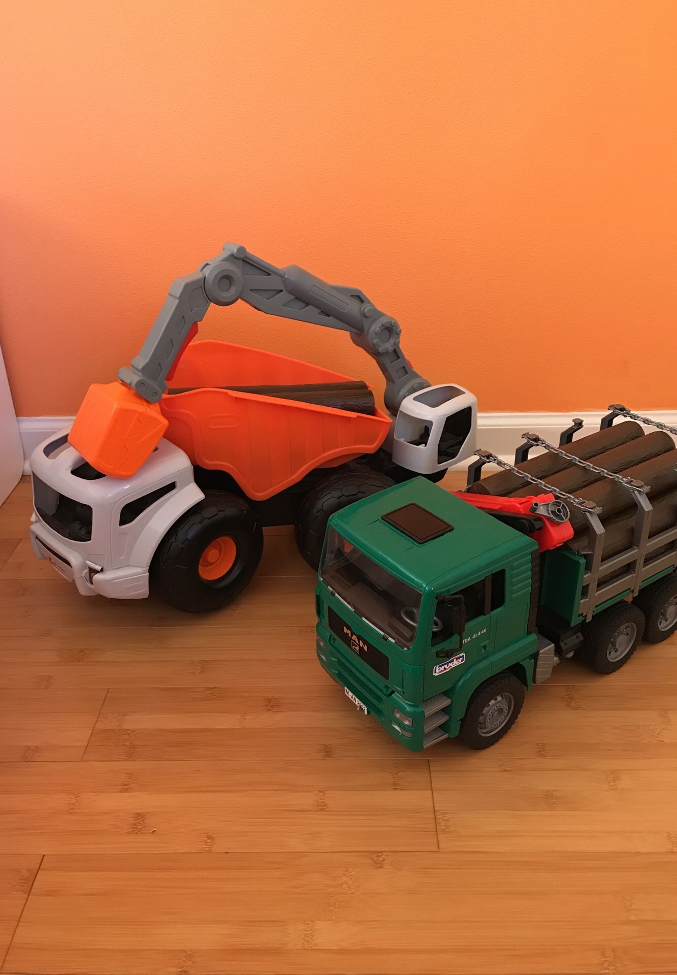 Large bruder logging truck & little tikes dumper