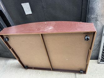 Brown wood storage with wheels