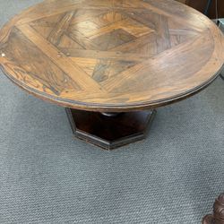  Stickley wooden round table on a traditional pedestal base