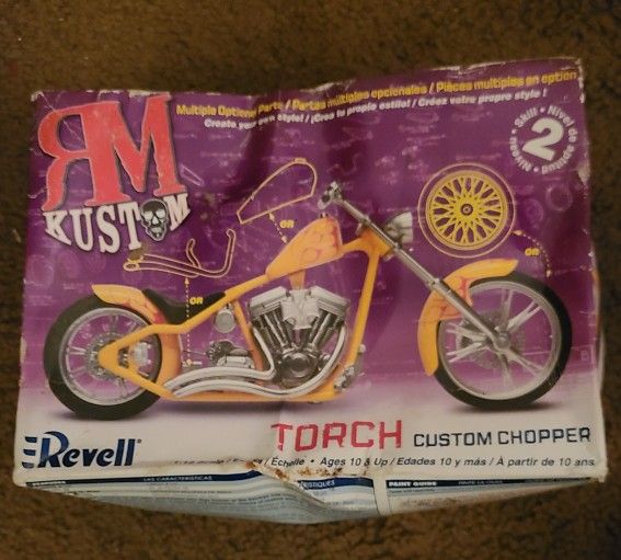 Revell RM Kustom torch custom chopper Model 1:12 scale, 8 1/2" L, 58 pieces, ages 10+ up. Box is smashed. 2006 