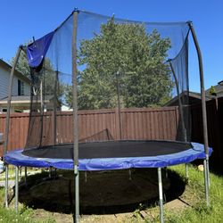 For Sale: 12-ft Skywalker Trampoline with Basketball Hoop – $80 OBO