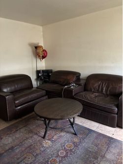 3 piece leather couch w/ 2 reclining chairs also charging section for your iPhone everything in pic included