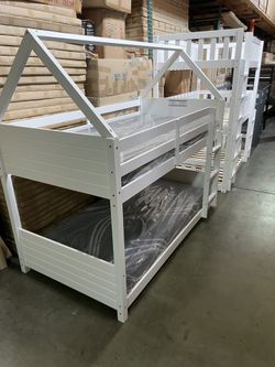 Twin house bunk bed. Available in white& espresso. Assembly required. Assembly not included. Tax included. Free local delivery.  Bunk bed only-$325 Bu