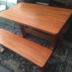 Medium size oak table, with two benches.