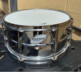 Ludwig Accent 14” x 6.5” Snare Drum, with case and practice pad.
