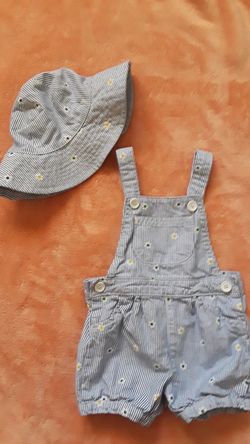 Blue sunflower hat and overalls. 3-9 months