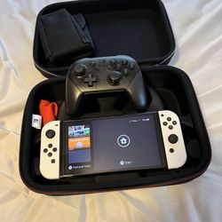 Nintendo Switch OLED W/pro Controller And Carrying Case 