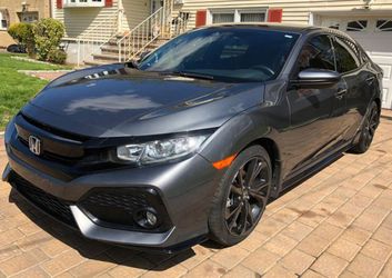 2019 Honda Civic Sport Black w/Fabric Seating Surfaces.