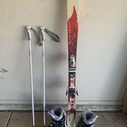 Used womens top skis and boots