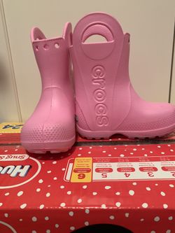 Pink Crocs rain boots (size 7)