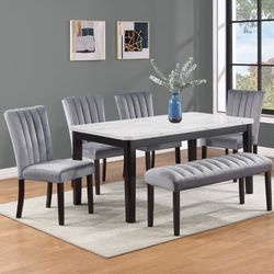 WHITE FAUX MARBLE DINING TABLE WITH VELVET GREY SEATING 