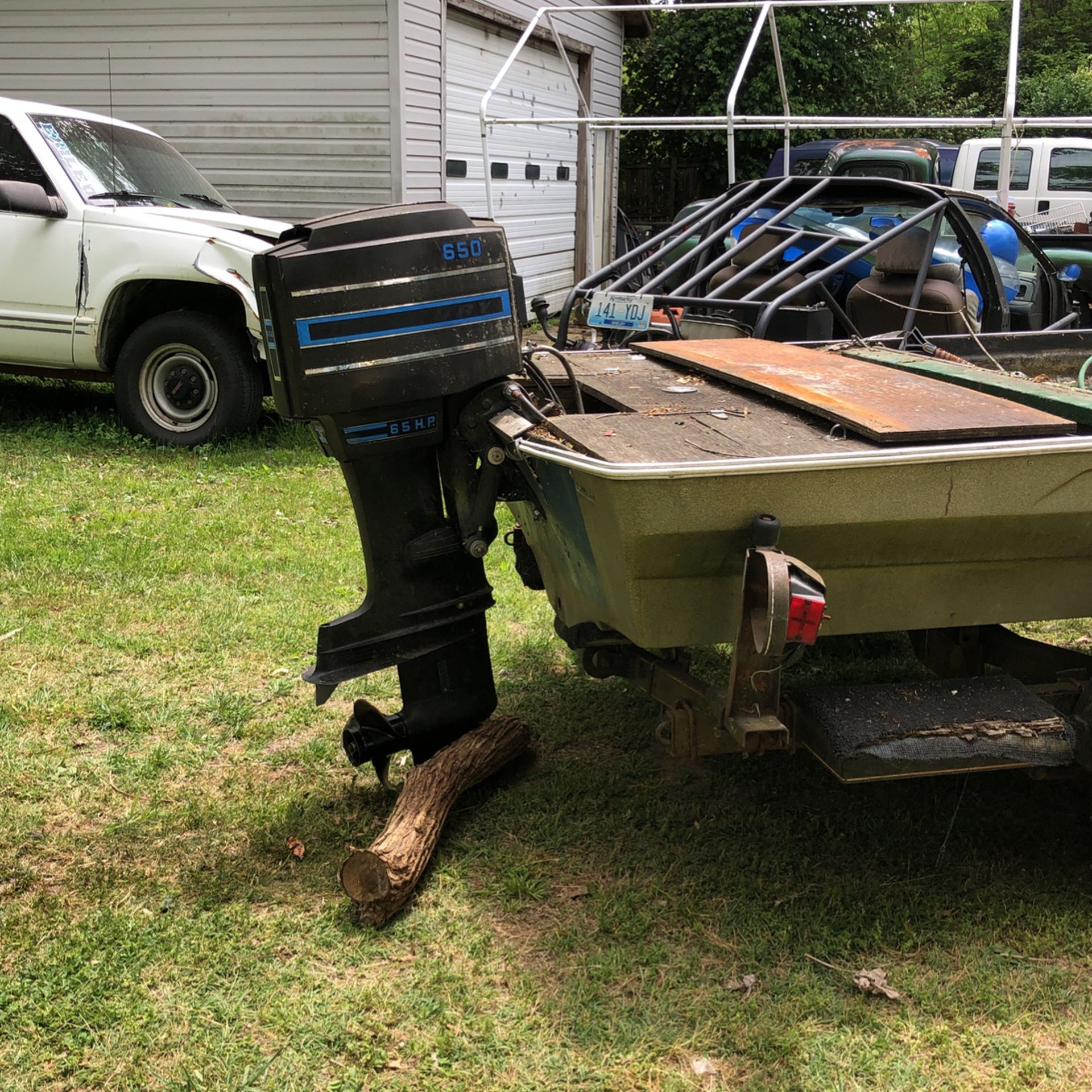 Mercury Motor And Boat And Trailer 