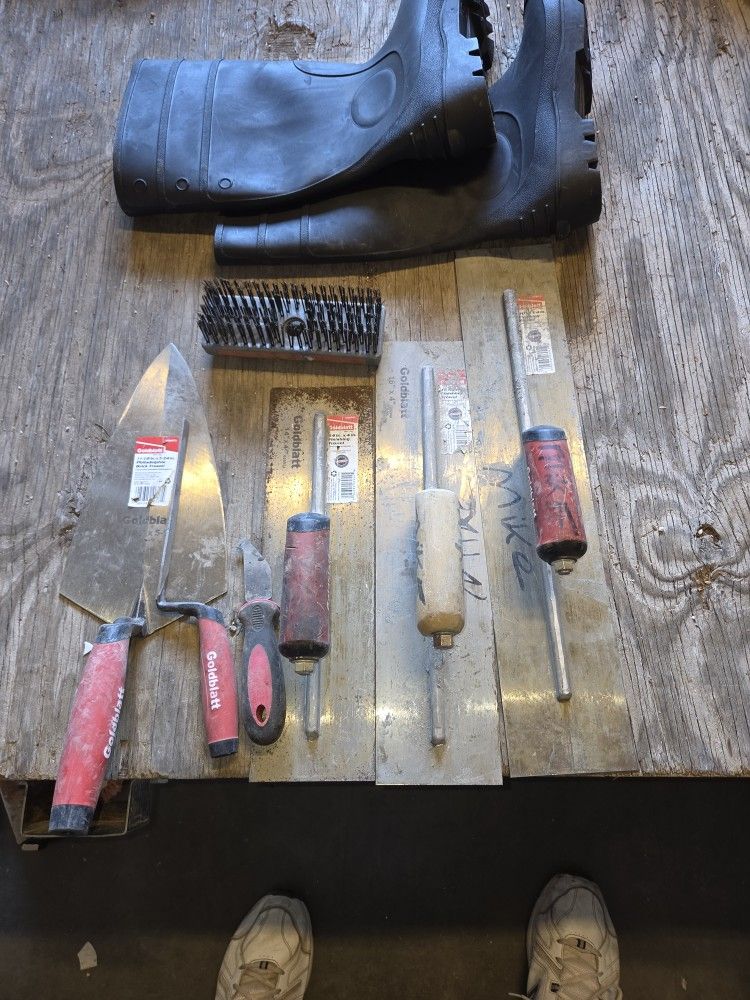 Cement finishing trowels boots and bag