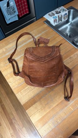 Brown Leather Backpack with Woven Detail