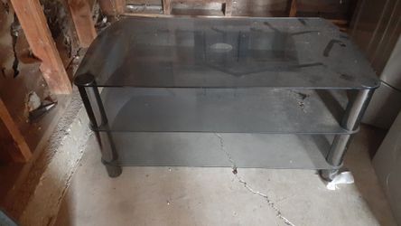 Glass tv stand fits 60 inch