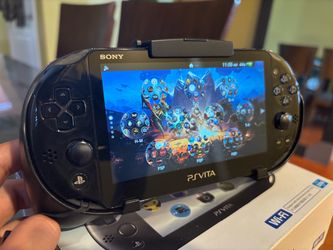 Modded PS Vita Silm with Hori Grip Attachment