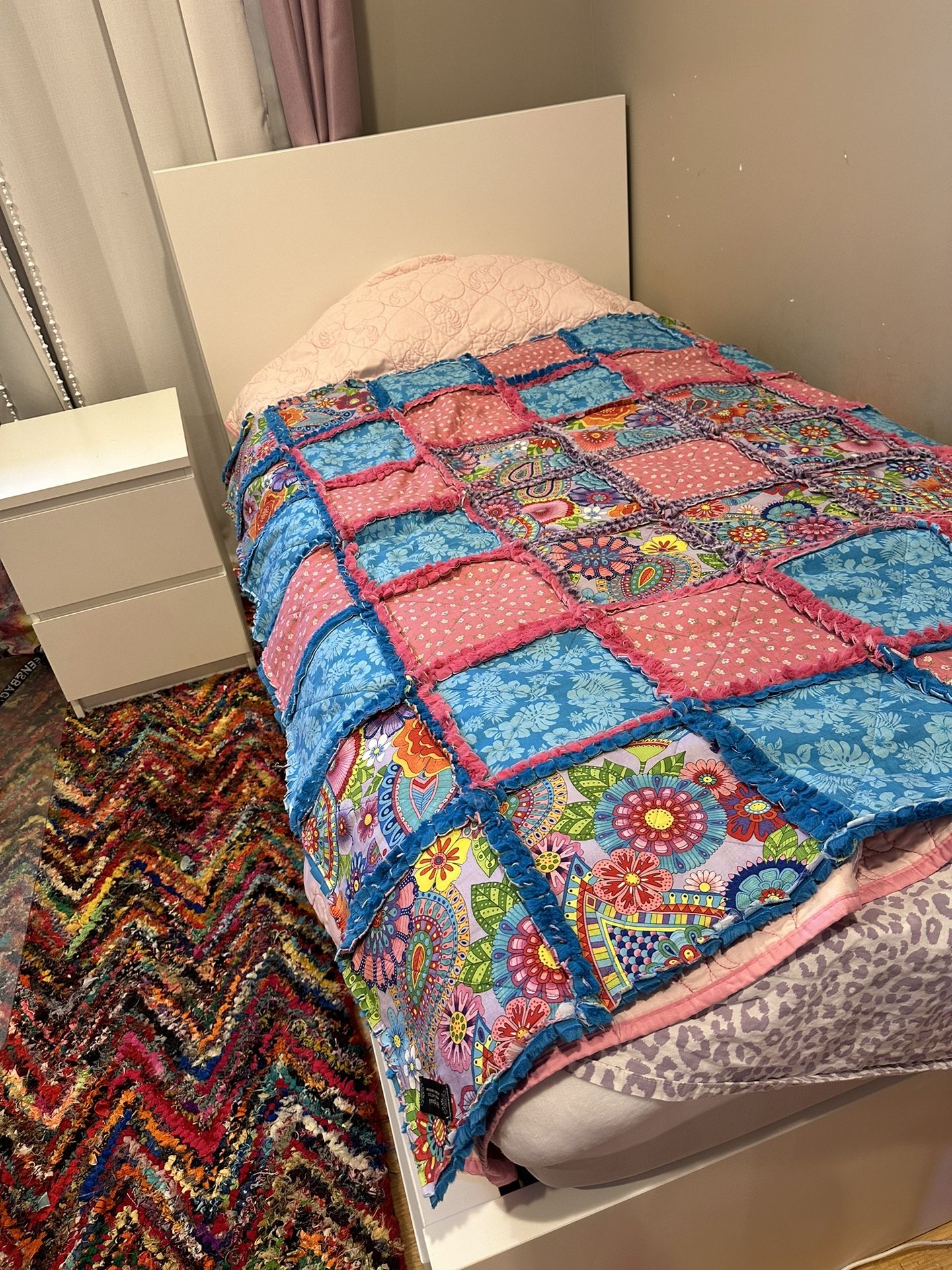 High twin bed frame with 2 storage boxes white, included night stand with drawers.