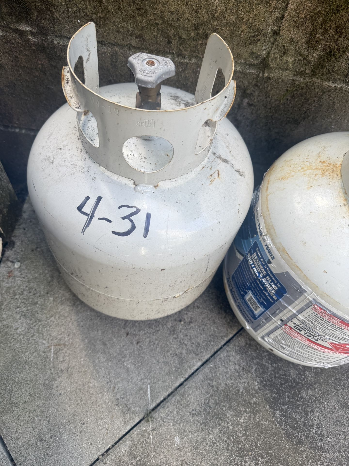 two butanes used twice almost full of liquid