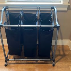 Rolling laundry hamper