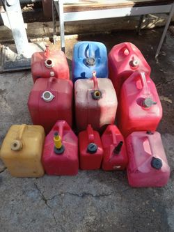 Gas Containers - (1) - 5 Gal & (4) - Small Containers